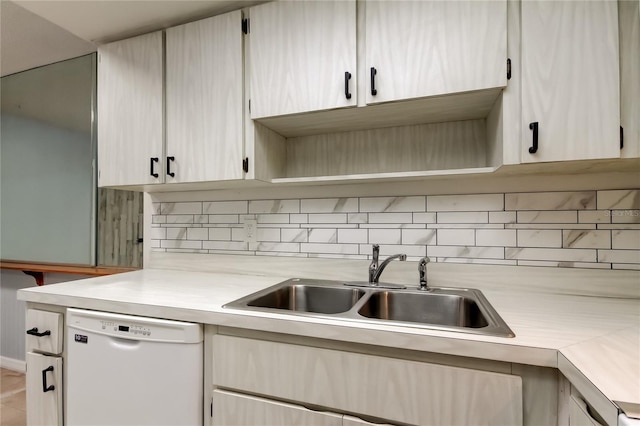 2380 Shelly Dr Unit B, Palm Harbor, FL 34684 - kitchen featuring dishwasher, light countertops, a sink, and tasteful backsplash