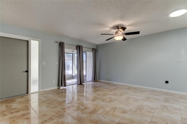 2380 Shelly Dr Unit B, Palm Harbor, FL 34684 - unfurnished room with a ceiling fan, a textured ceiling, baseboards, and light tile patterned flooring