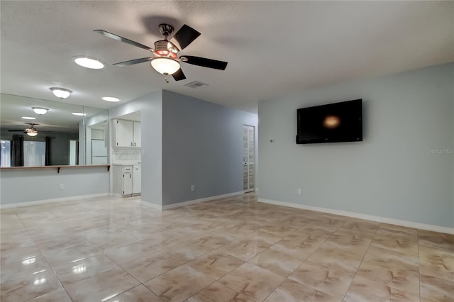 2380 Shelly Dr Unit B, Palm Harbor, FL 34684 - unfurnished living room featuring a ceiling fan, light tile patterned floors, and baseboards