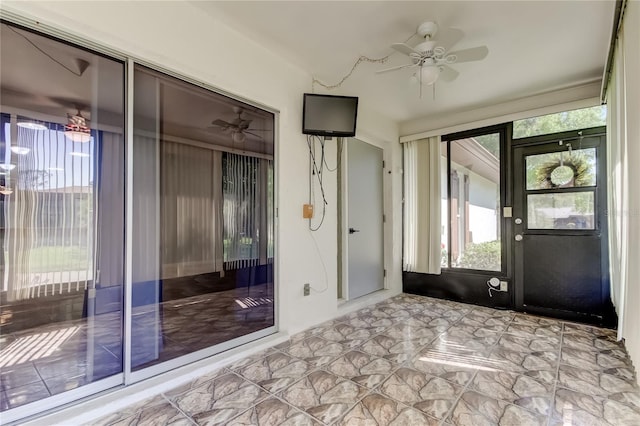 2380 Shelly Dr Unit B, Palm Harbor, FL 34684 - foyer entrance featuring plenty of natural light, ceiling fan, and marble finish floors
