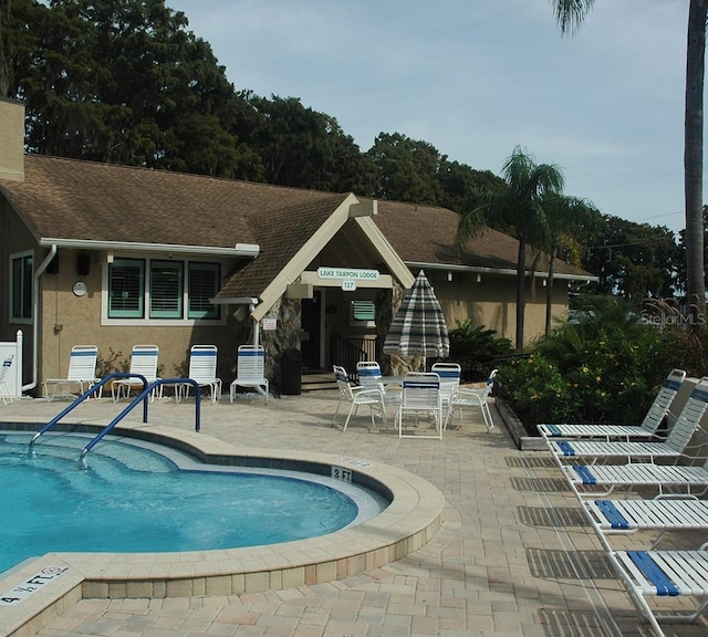 2380 Shelly Dr Unit B, Palm Harbor, FL 34684 - community pool featuring a patio area