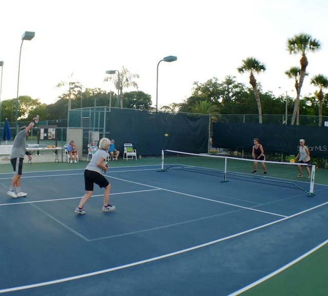 2380 Shelly Dr Unit B, Palm Harbor, FL 34684 - view of tennis court with fence