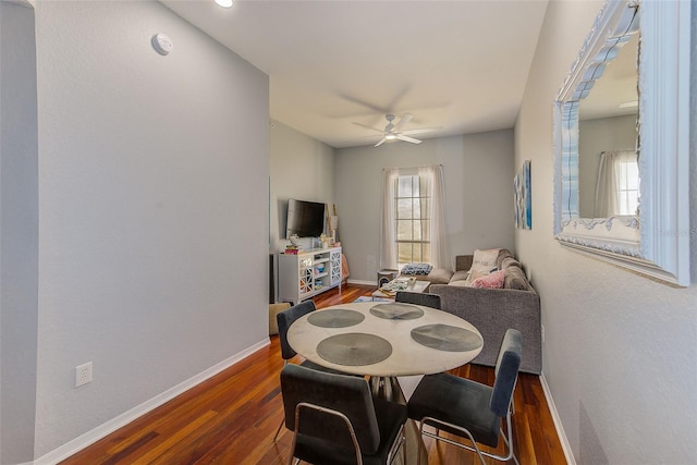 402 S Armenia Ave Unit 139A, Tampa, FL 33609 - dining area featuring dark wood finished floors, baseboards, and ceiling fan