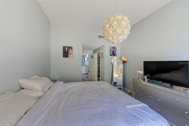 402 S Armenia Ave Unit 139A, Tampa, FL 33609 - bedroom featuring a chandelier and baseboards
