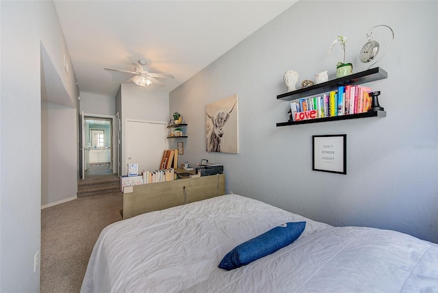 402 S Armenia Ave Unit 139A, Tampa, FL 33609 - bedroom with carpet floors, baseboards, and ceiling fan