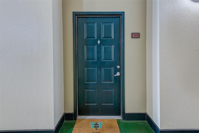 402 S Armenia Ave Unit 139A, Tampa, FL 33609 - property entrance with stucco siding