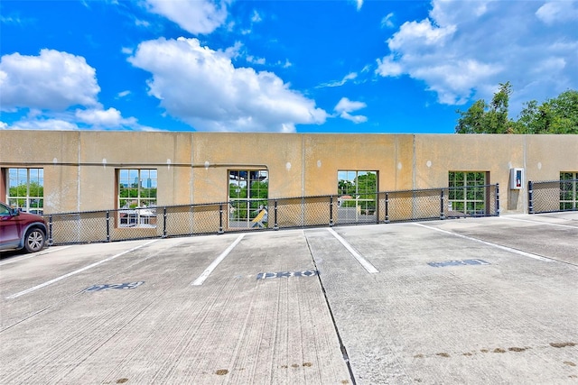 402 S Armenia Ave Unit 139A, Tampa, FL 33609 - uncovered parking lot with a gate and fence