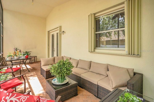 balcony featuring an outdoor hangout area and a patio