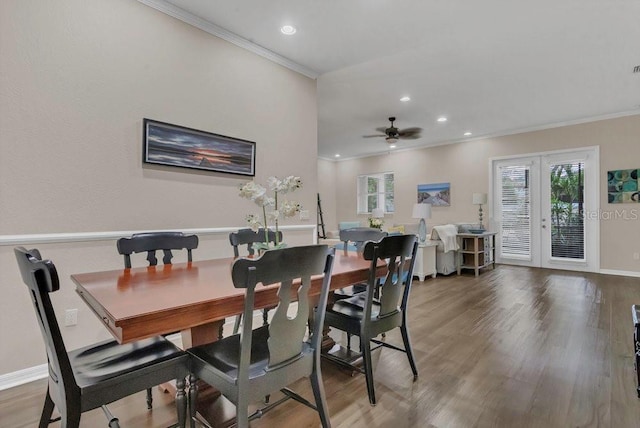 dining space featuring ornamental molding, recessed lighting, wood finished floors, baseboards, and french doors