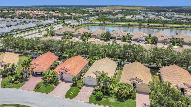 aerial perspective of suburban area with a large body of water