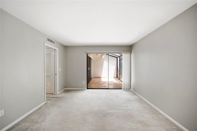 4006 Cypress Ln Unit 4006, Tampa, FL 33618 - carpeted empty room with baseboards
