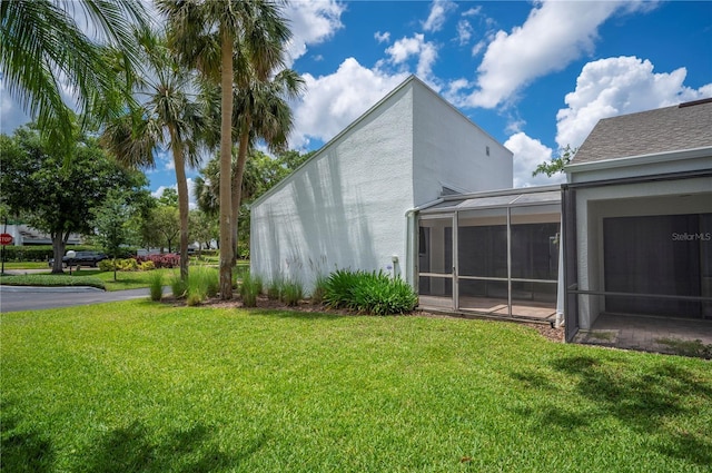 4006 Cypress Ln Unit 4006, Tampa, FL 33618 - view of grassy yard with a sunroom