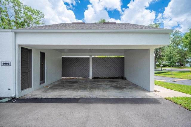 4006 Cypress Ln Unit 4006, Tampa, FL 33618 - garage with a carport and driveway
