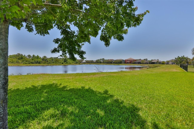 water view featuring fence