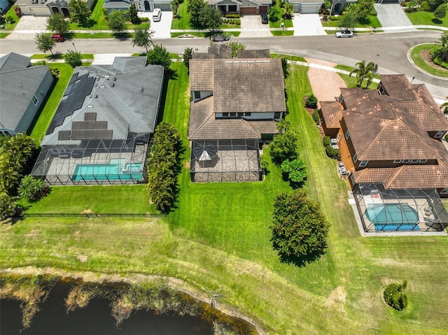 aerial view of residential area with a pool