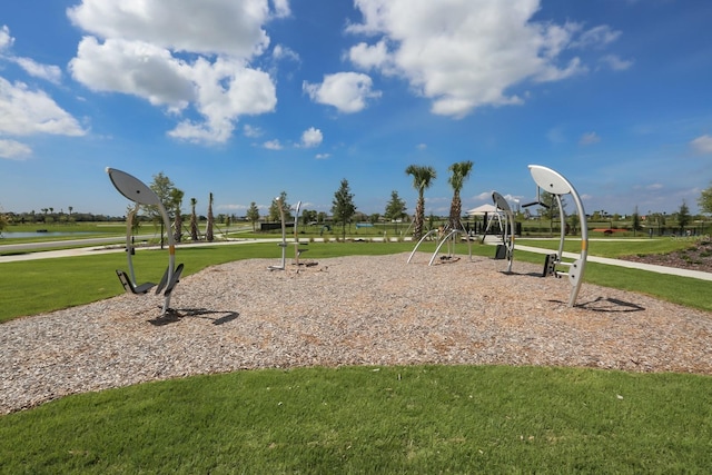community playground with a lawn