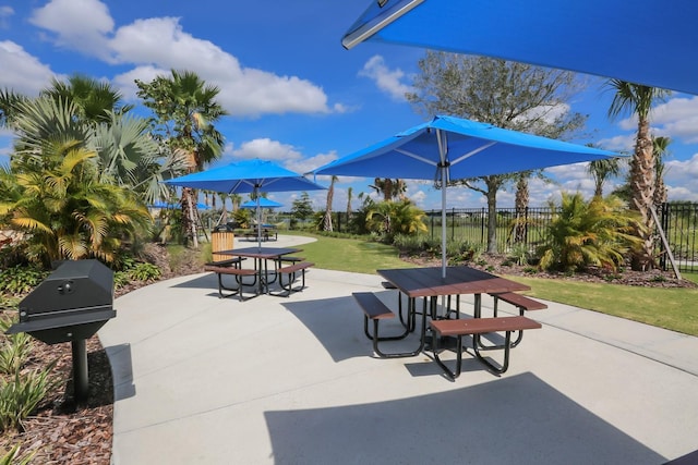 view of patio featuring outdoor dining area