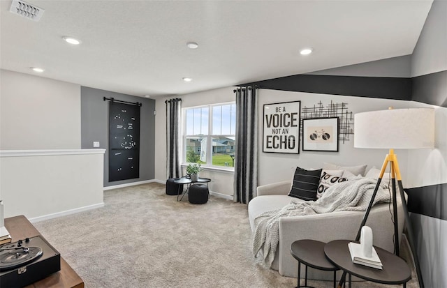 1075 Silverlake Blvd, Lake Alfred, FL 33850 - sitting room featuring carpet floors, recessed lighting, baseboards, and a barn door