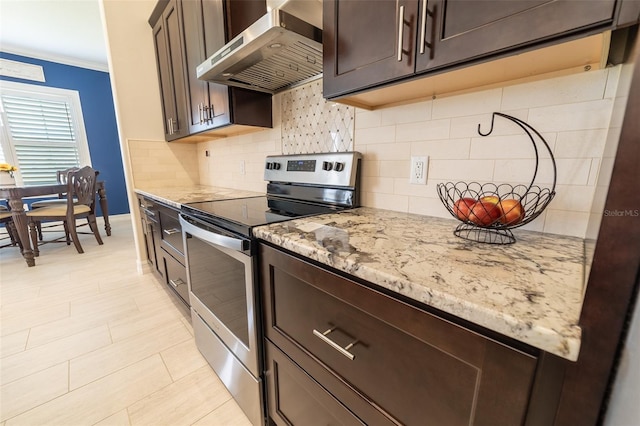 2484 SW 33rd Cir, Okeechobee, FL 34974 - kitchen with electric range, wall chimney range hood, dark brown cabinets, decorative backsplash, and ornamental molding