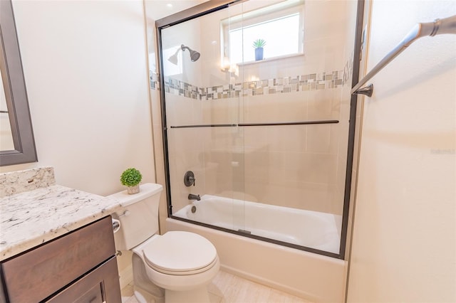 2484 SW 33rd Cir, Okeechobee, FL 34974 - bathroom featuring shower / bath combination with glass door and vanity