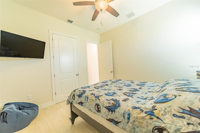 2484 SW 33rd Cir, Okeechobee, FL 34974 - bedroom featuring a ceiling fan and baseboards