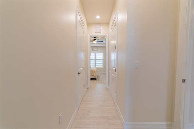 2484 SW 33rd Cir, Okeechobee, FL 34974 - hall featuring recessed lighting and baseboards