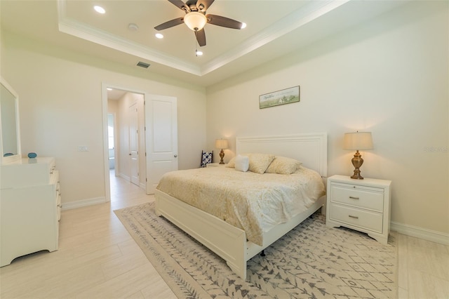2484 SW 33rd Cir, Okeechobee, FL 34974 - bedroom featuring crown molding, recessed lighting, a raised ceiling, a ceiling fan, and light wood-style flooring