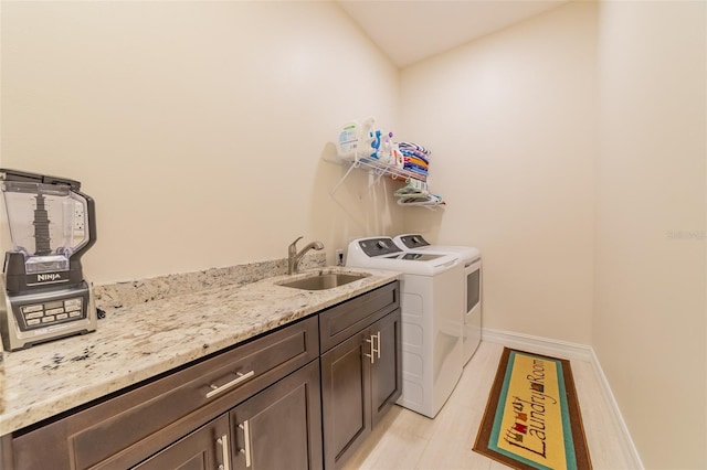 2484 SW 33rd Cir, Okeechobee, FL 34974 - laundry room featuring independent washer and dryer and cabinet space