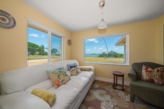 1963 Edgewater Dr, Clearwater, FL 33755 - living area featuring baseboards