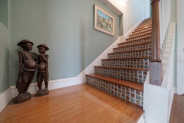 1963 Edgewater Dr, Clearwater, FL 33755 - stairs featuring wood finished floors