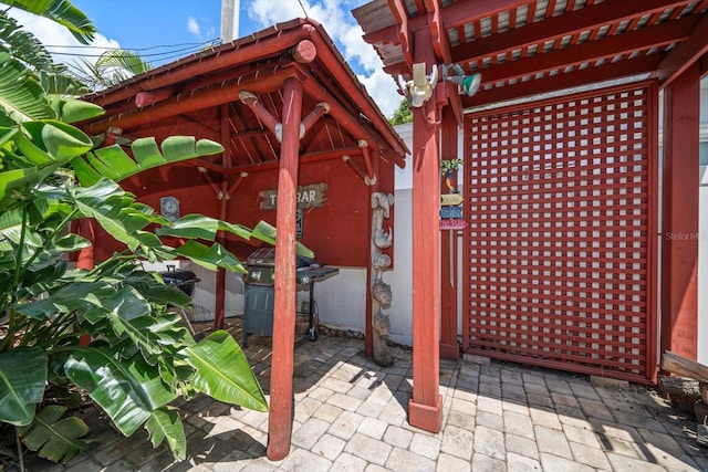 1963 Edgewater Dr, Clearwater, FL 33755 - view of patio with a grill