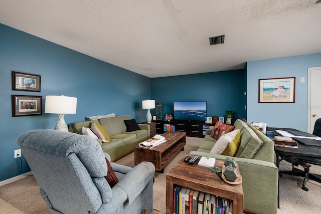 carpeted living room featuring a textured ceiling, an office area, and baseboards