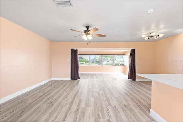 5108 Commonwealth Rd, Palmetto, FL 34221 - unfurnished room with baseboards, light wood-style flooring, and ceiling fan