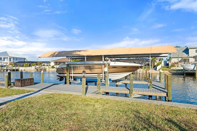 5108 Commonwealth Rd, Palmetto, FL 34221 - dock with boat lift, a water view, and a lawn