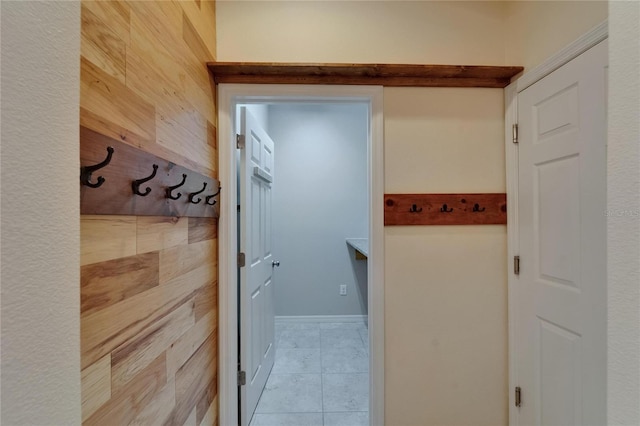 corridor with tile patterned floors