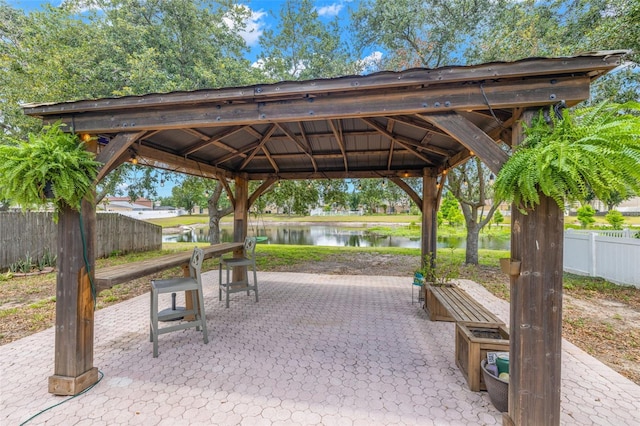 13643 Tramore Dr, Odessa, FL 33556 - surrounding community featuring a gazebo, a patio area, a water view, and fence