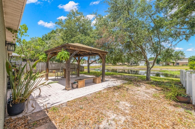 13643 Tramore Dr, Odessa, FL 33556 - view of yard featuring a gazebo, a water view, and fence