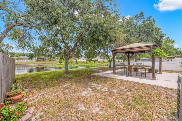 13643 Tramore Dr, Odessa, FL 33556 - view of yard with a gazebo, a water view, fence, and a patio