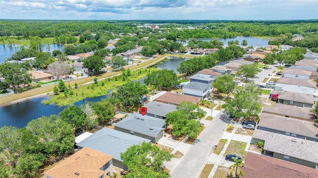 13643 Tramore Dr, Odessa, FL 33556 - aerial view of residential area featuring a large body of water and a forest
