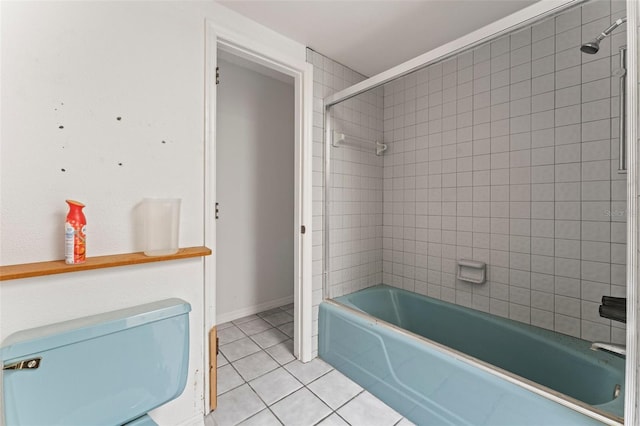 5 Marina Ter, Treasure Island, FL 33706 - full bathroom featuring tile patterned flooring,  shower combination, and baseboards