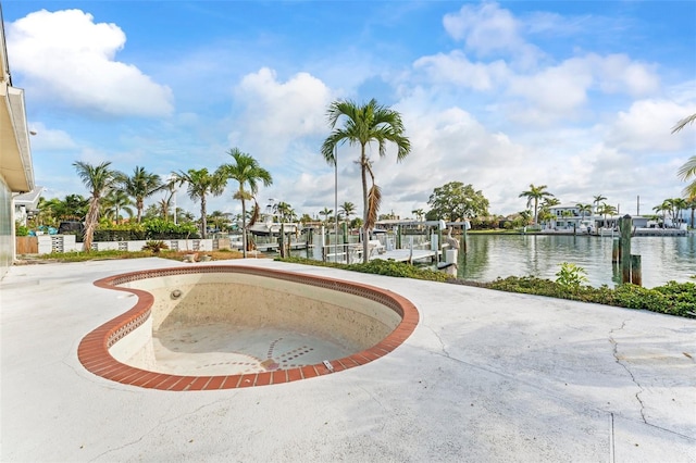 5 Marina Ter, Treasure Island, FL 33706 - view of swimming pool with a boat dock, a water view, and boat lift