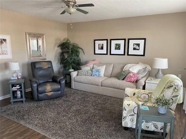 8455 112th St Unit 212, Seminole, FL 33772 - living area featuring a ceiling fan, wood finished floors, and baseboards