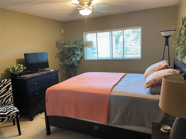 8455 112th St Unit 212, Seminole, FL 33772 - bedroom with light carpet and a ceiling fan