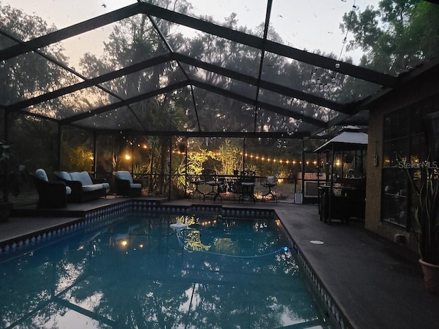 314 Bloomingfield Dr, Brandon, FL 33511 - swimming pool with glass enclosure and a patio