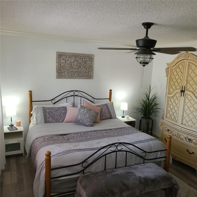 314 Bloomingfield Dr, Brandon, FL 33511 - bedroom with a textured ceiling, wood finished floors, and ornamental molding