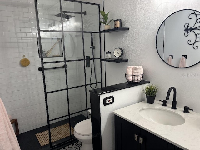 314 Bloomingfield Dr, Brandon, FL 33511 - full bath with toilet, a stall shower, vanity, and a textured wall