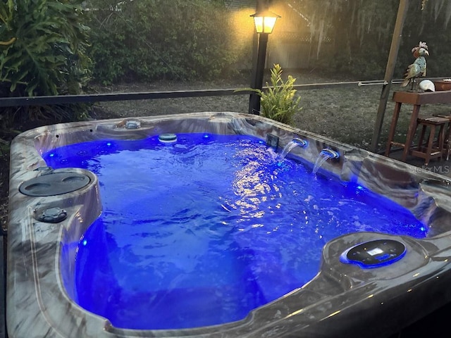 314 Bloomingfield Dr, Brandon, FL 33511 - view of pool with a hot tub and glass enclosure