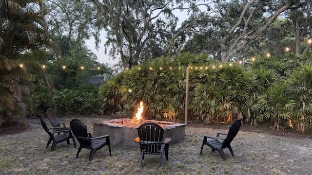 314 Bloomingfield Dr, Brandon, FL 33511 - view of yard with an outdoor fire pit