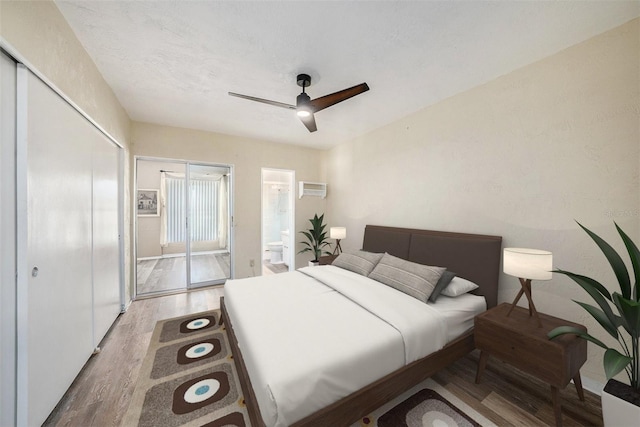 2002 Australia Way E Unit 66, Clearwater, FL 33763 - bedroom featuring wood finished floors, ceiling fan, and a closet