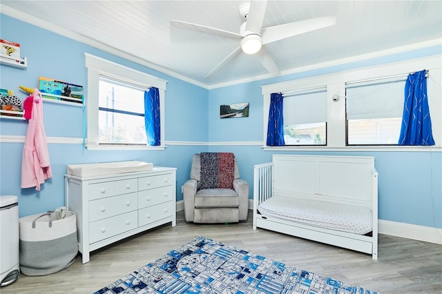 9802 N Oregon Ave, Tampa, FL 33612 - bedroom with wood finished floors, ceiling fan, baseboards, and wood ceiling